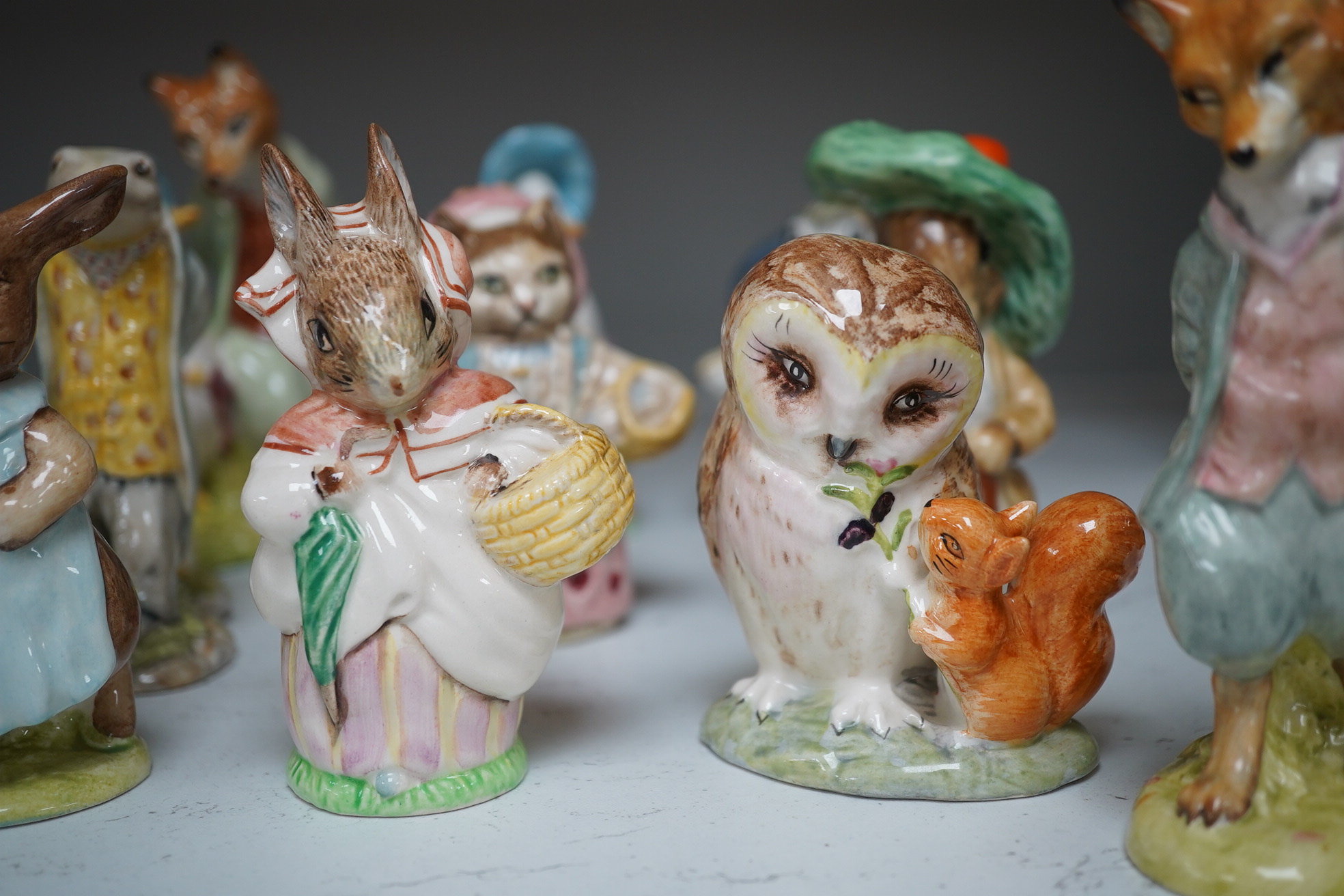 A collection of nineteen Beswick ‘Beatrix Potter’ figures, tallest Foxy Whiskered Gentleman, 12cm high. Condition - fair to good